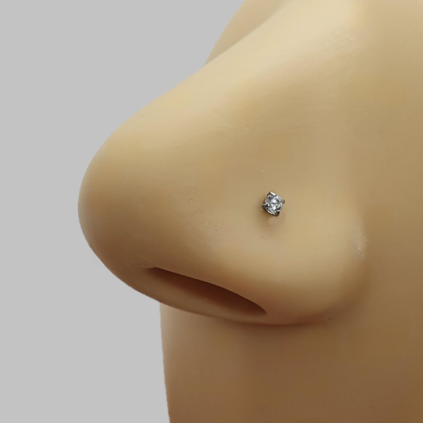 Nose screw stud with 2 mm Cubic Zirconia stone ( surgical steel )