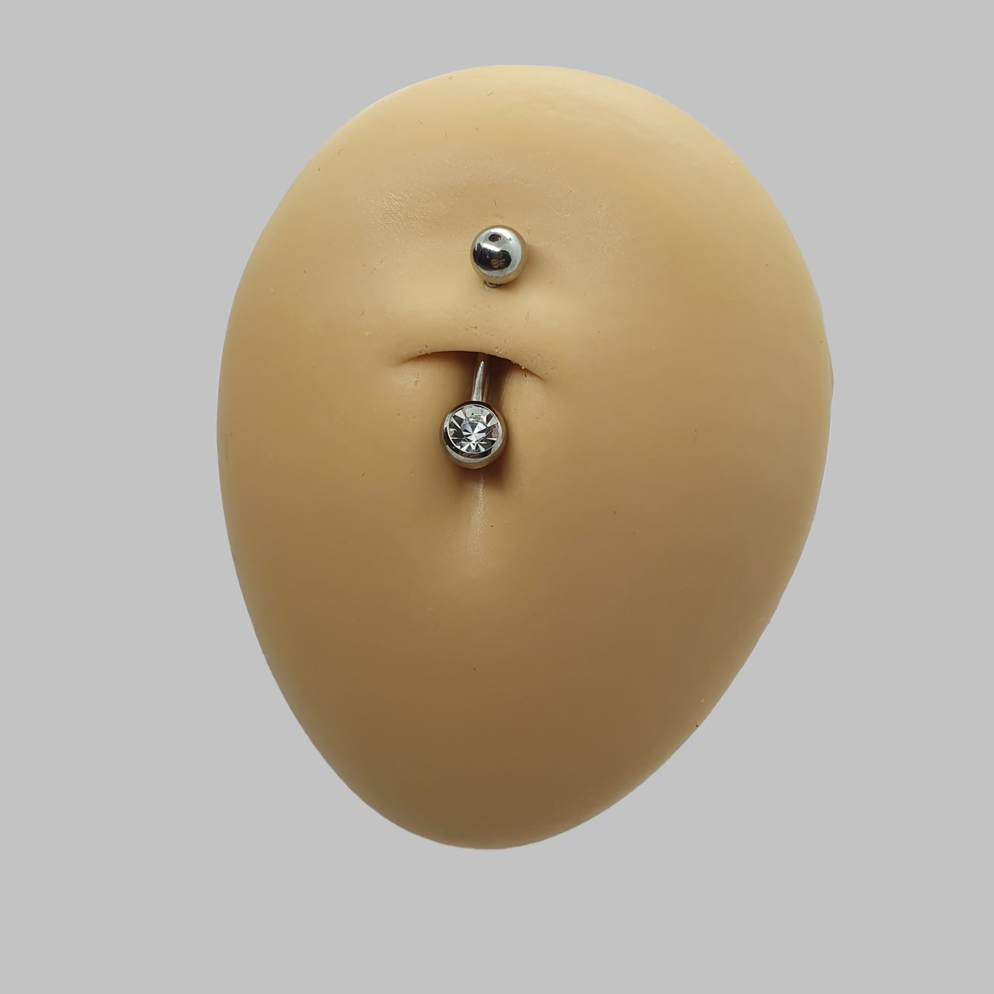 Belly button bar with a 6mm ball and an upper 5mm plain steel ball ( surgical steel )