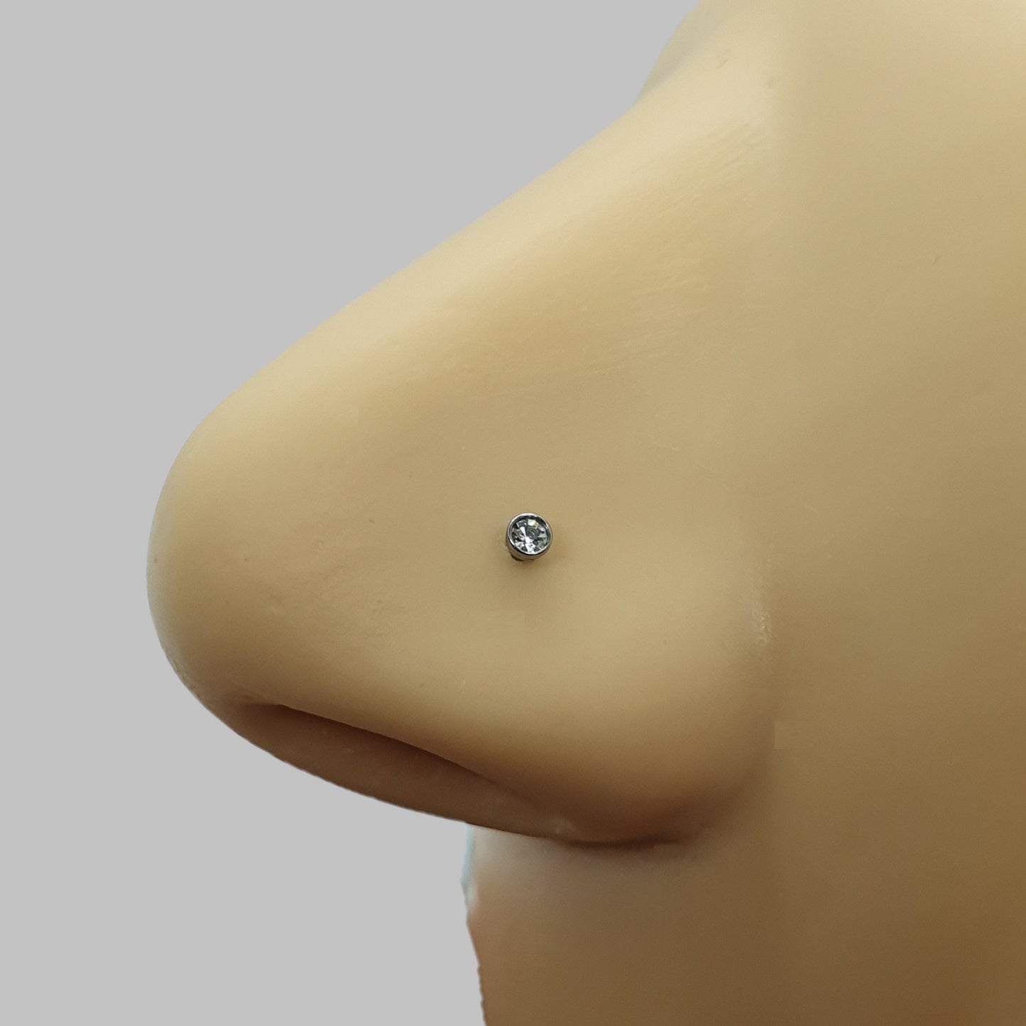 Nose screw stud with 2mm crystal stone ( surgical steel )