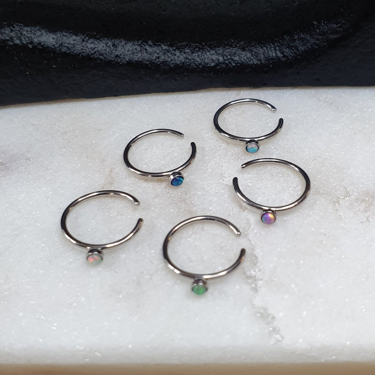 Continuous Ring with synthetic opal ( surgical steel )