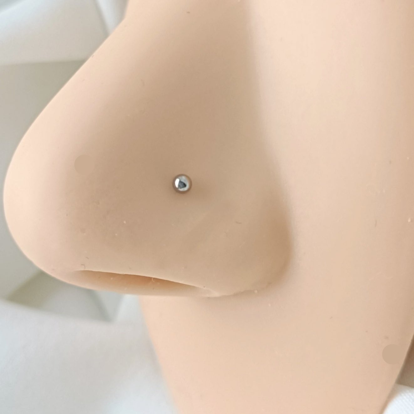 L-shaped nose stud with 2mm ball ( surgical steel )