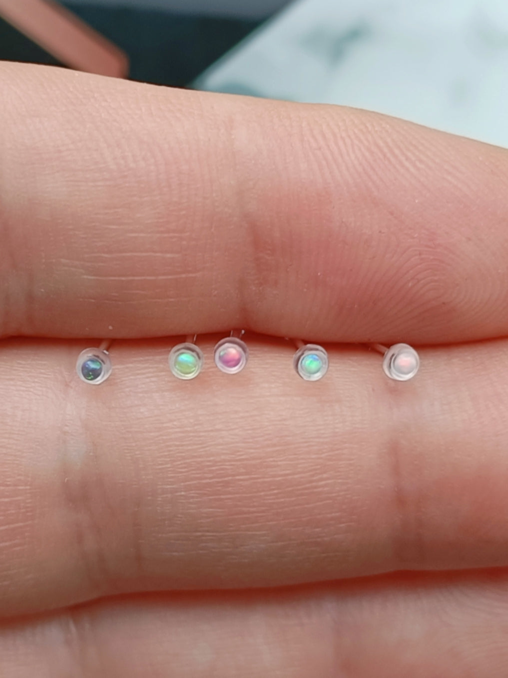 Straight nose stud with 1.5mm round synthetic opal ( acrylic )