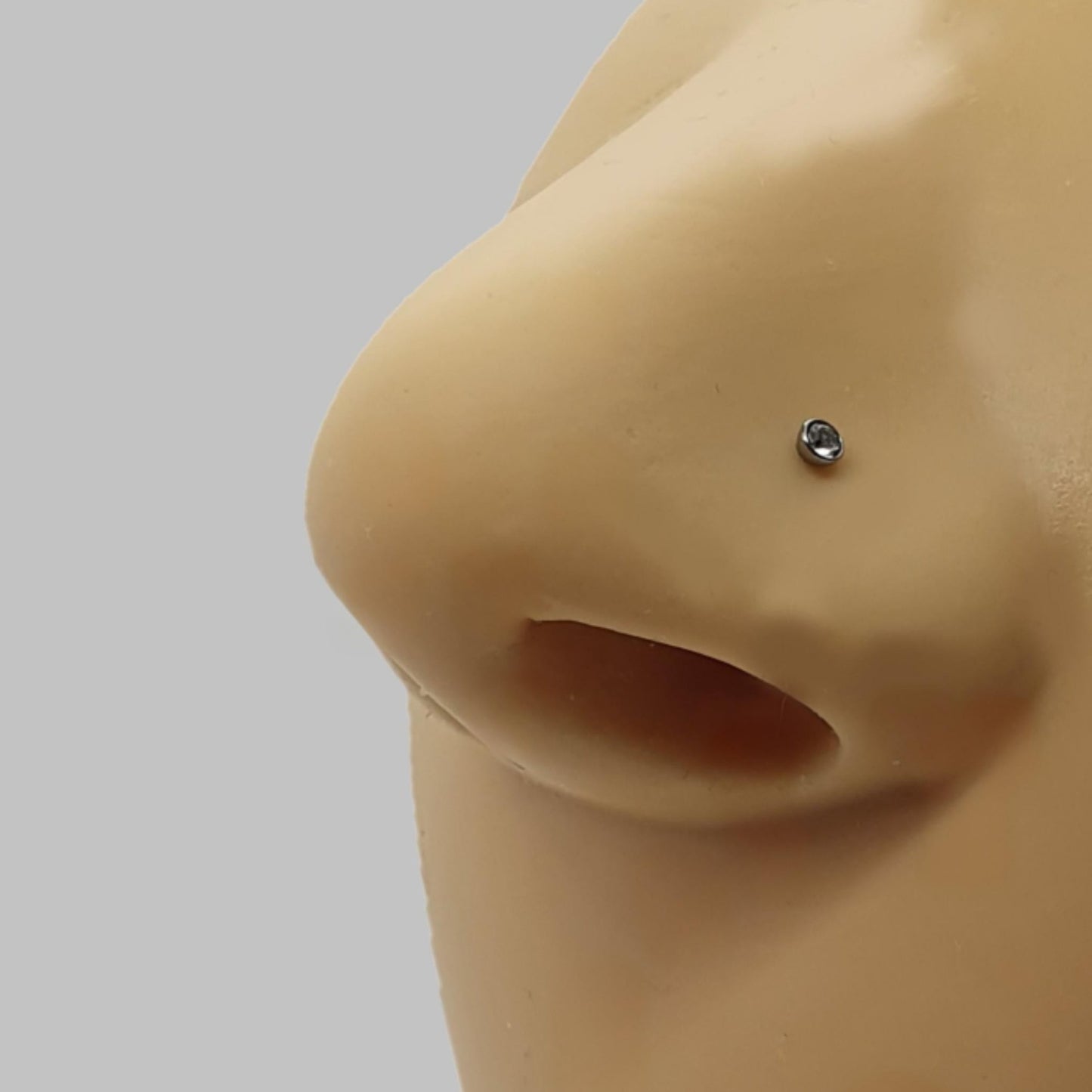 Straight nose stud with 2mm crystal top ( surgical steel  )