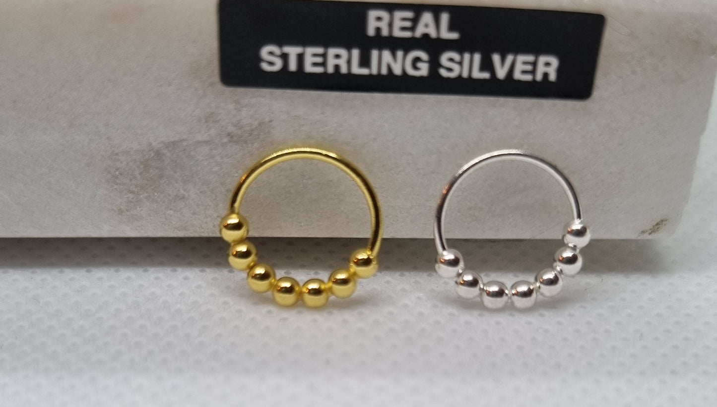 Continuous ring with seven 2mm beads ( sterling silver )