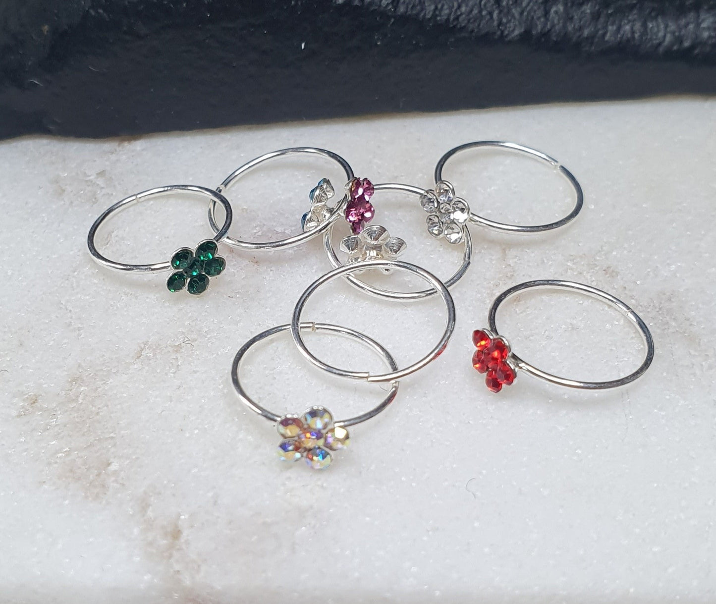 Continuous Nose ring with crystals flower top ( sterling silver )