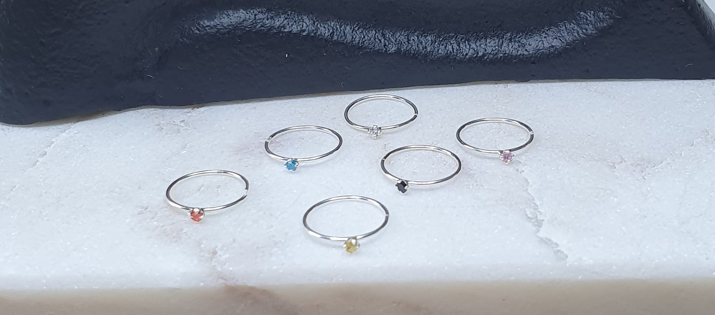 Continuous Nose ring with a 1.5mm round Cubic Zirconia stone ( sterling silver )