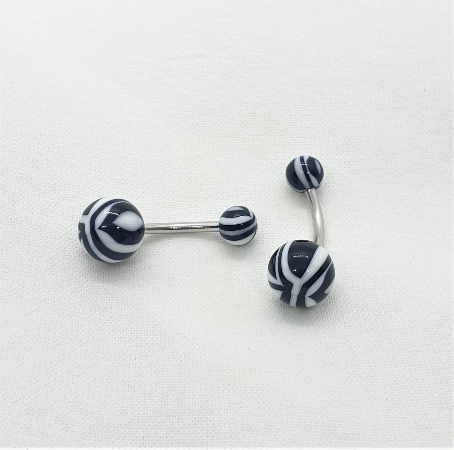 Belly button bar with 5 and 8mm acrylic zebra striped ( surgical steel )