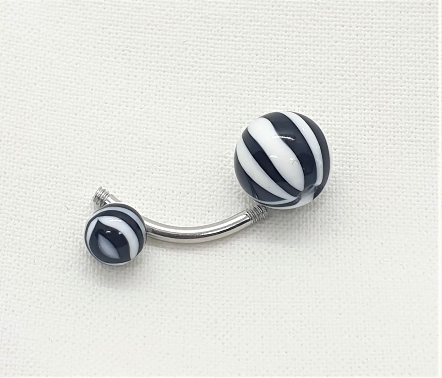 Belly button bar with 5 and 8mm acrylic zebra striped ( surgical steel )