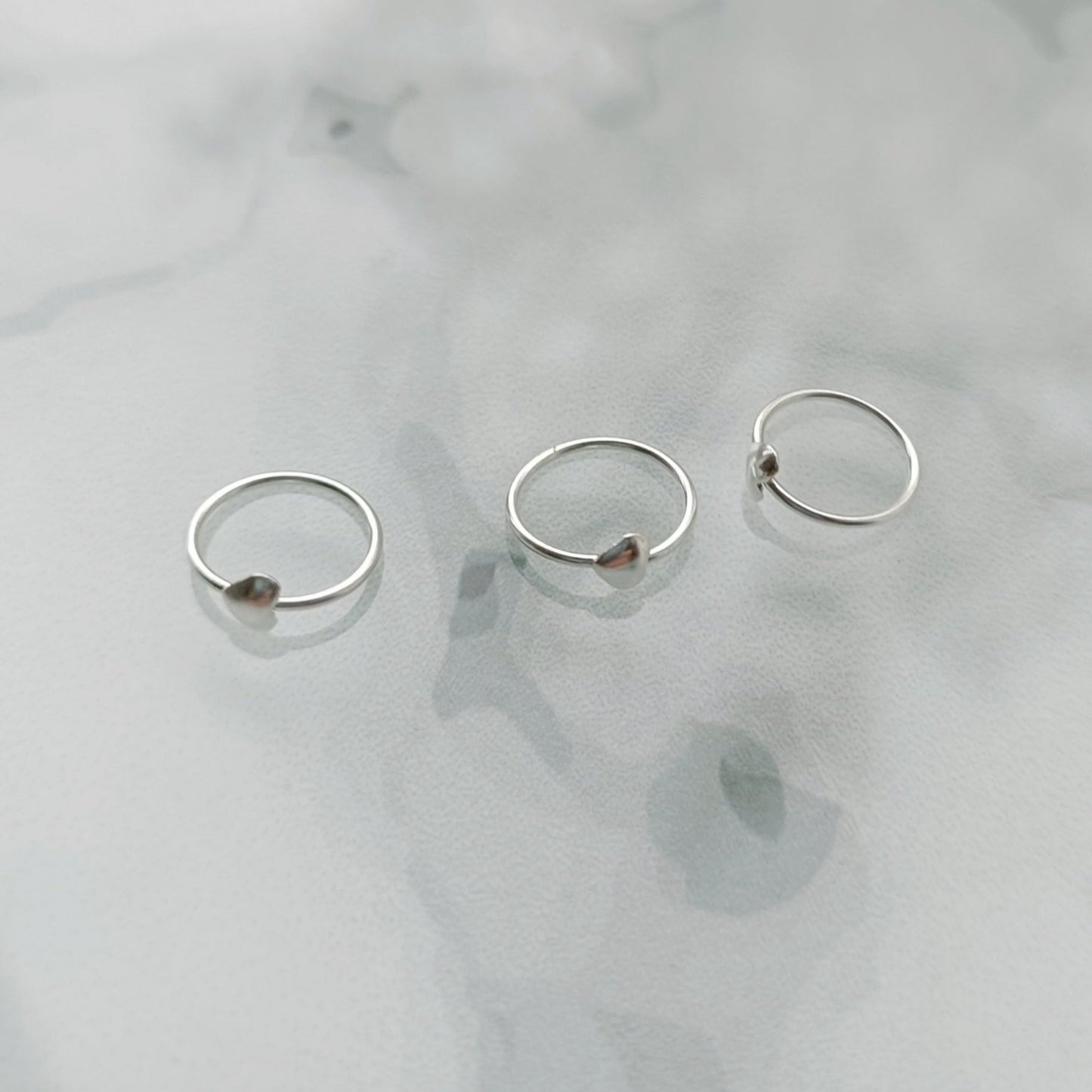 Continuous ring with heart design ( sterling silver )