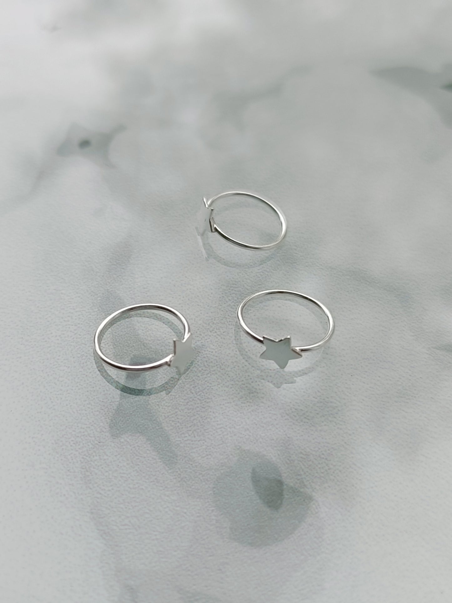 Continuous ring with star design ( sterling silver )