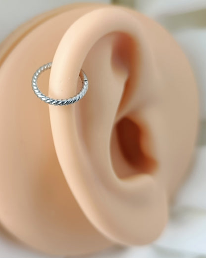 Piercing clicker hinged segment twisted wire ( surgical steel )