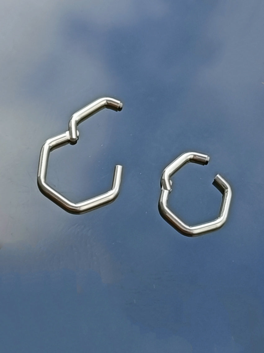 Piercing clicker hinged segment hexagon ( surgical steel  )
