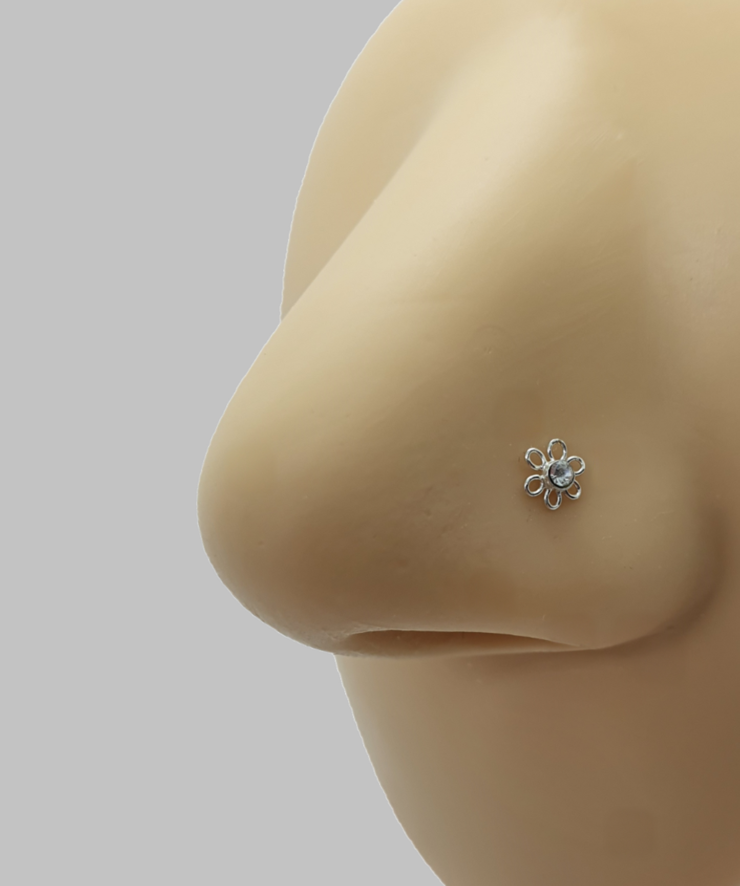 Bend IT nose stud with  flower shaped top ( sterling silver )