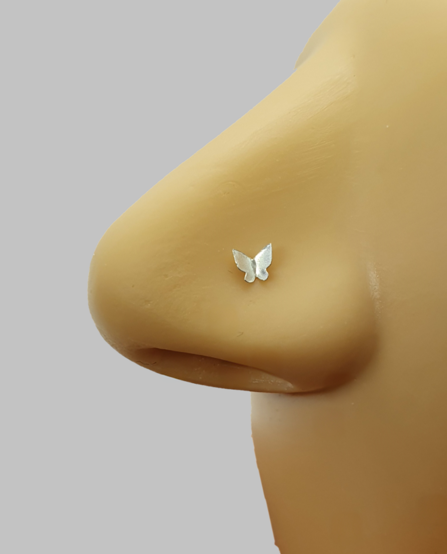 Bend IT nose stud with butterfly shaped top ( sterling silver )